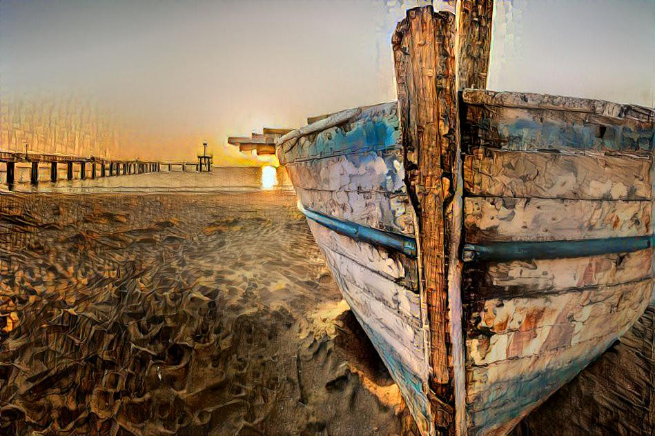 old wooden boat at sunrise