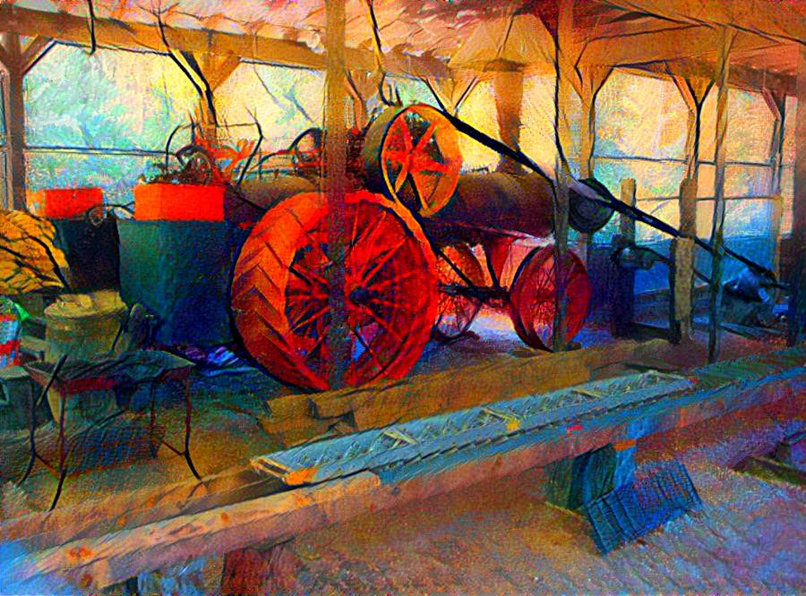 Large Steam Tractor Connected to Sawmill