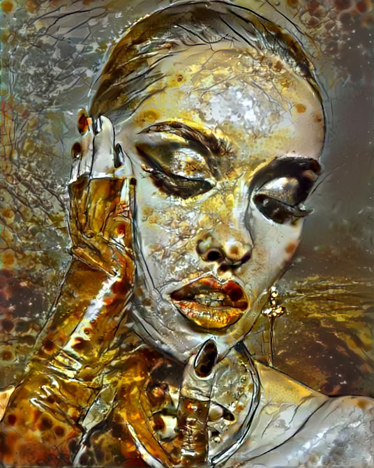 model touching chin, gold, white