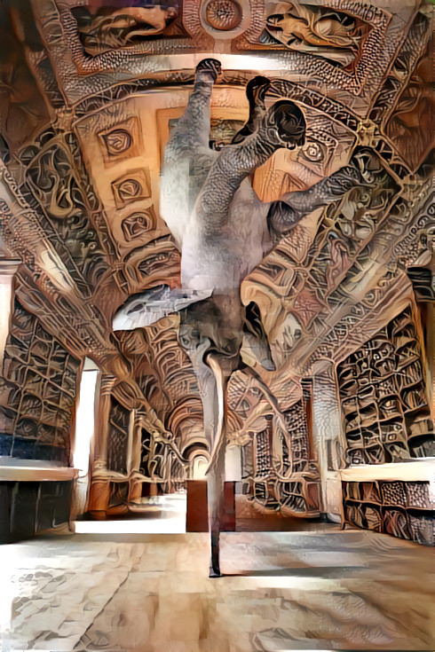 elephant spinning on trunk in fancy hallway