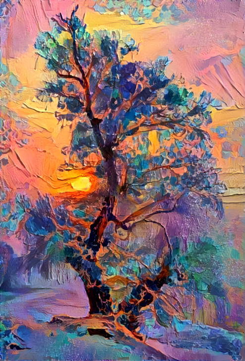 snowy tree painted with orange, green, blue