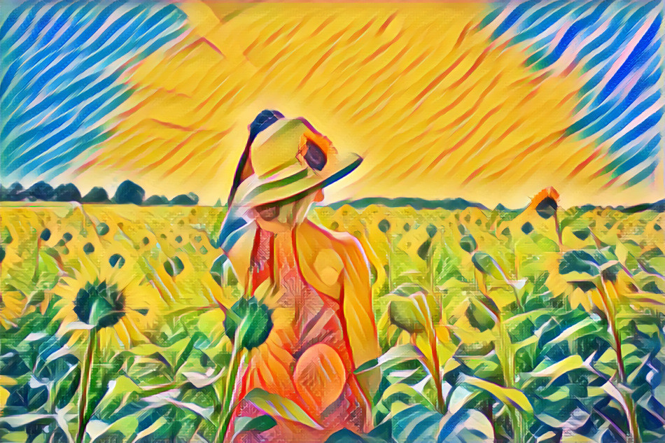 Woman in sunflowers field