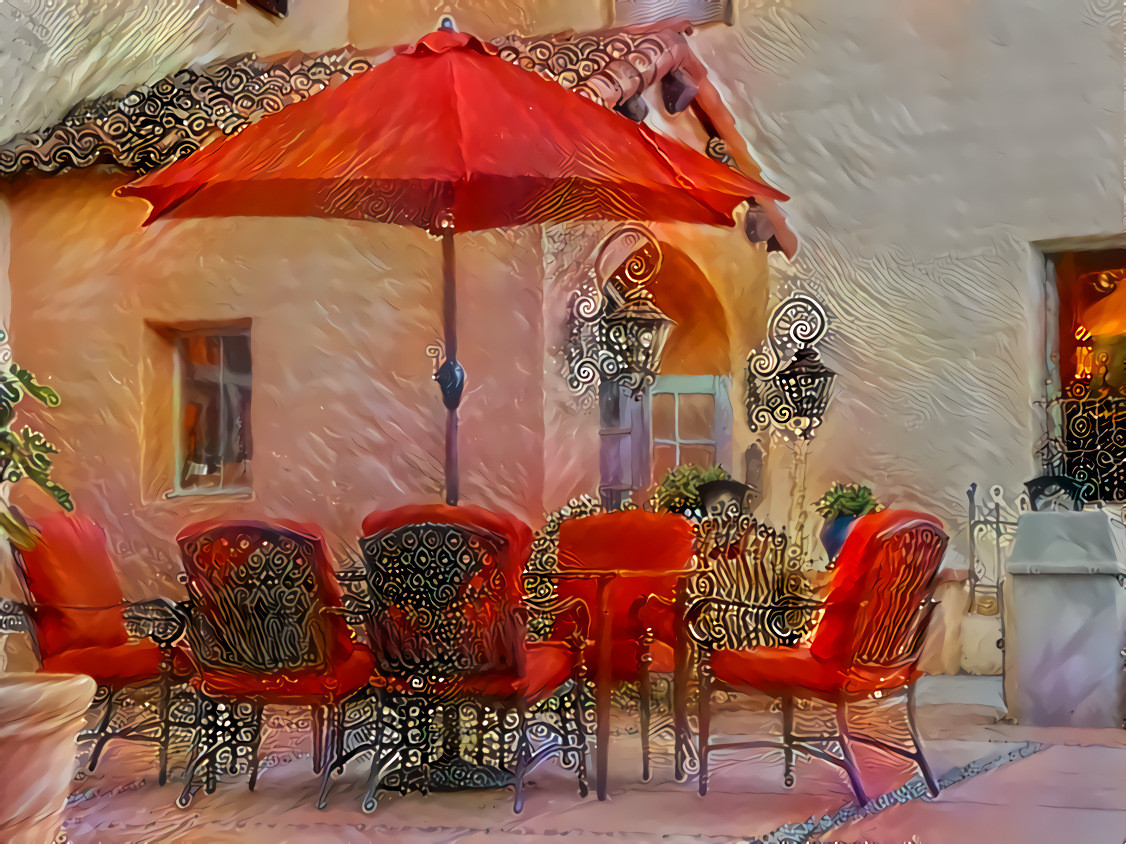 Red Chairs and a Red Umbrella. Winslow, Arizona. Photo, my own.
