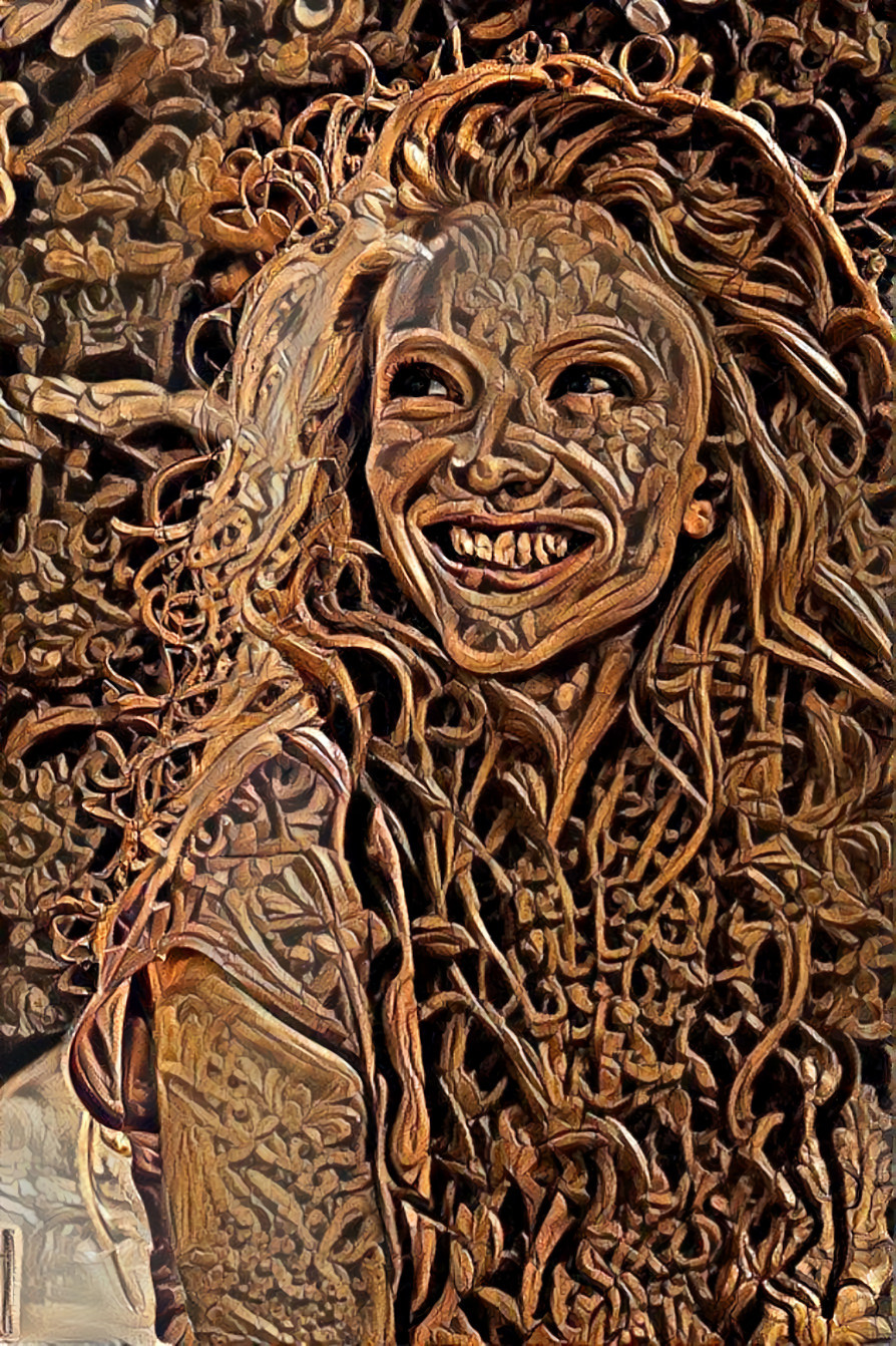 redhead model smiling into sunshine, wood carving