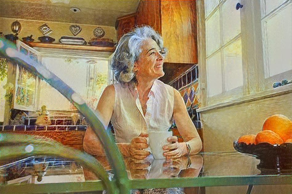 Woman drinking cup of coffee in kitchen