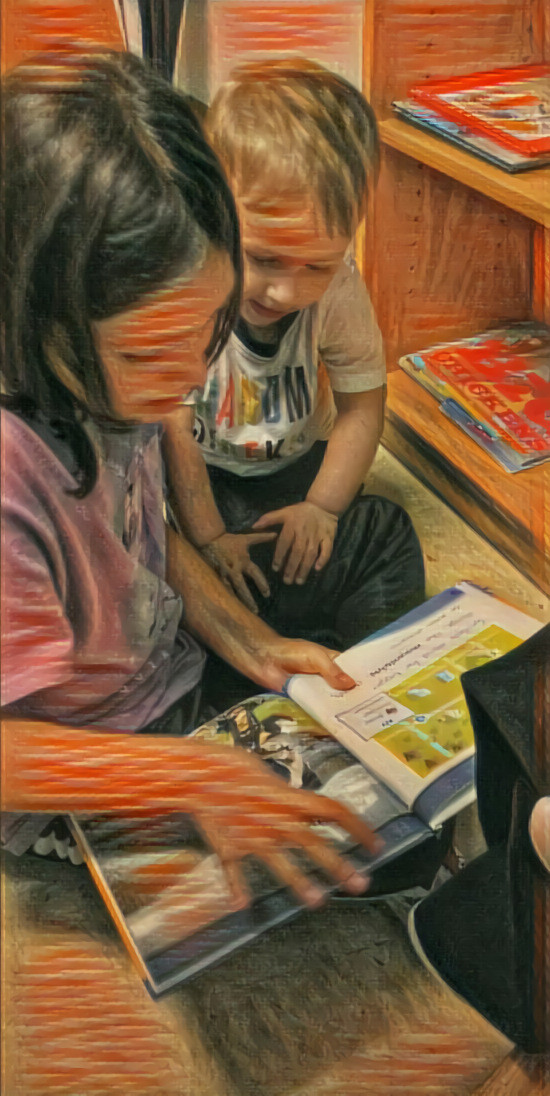 Big Sister reading to her Baby Brother 2019